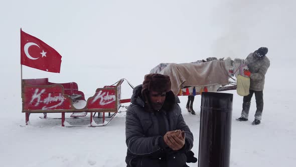 Wood Stove and Sled in Freezing Weather