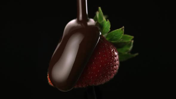 Chocolate sauce on strawberry, Slow Motion