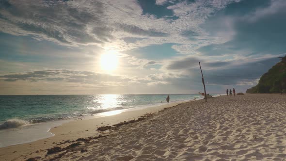 People Strolling Along Gorgeous Beach Philippines