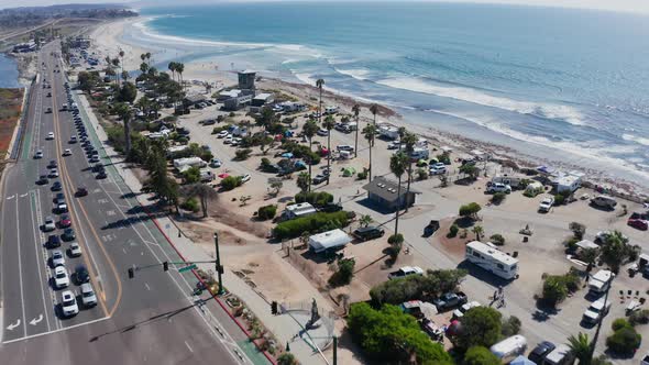 Panoramic aerial view of Cardiff State Beach in California. Drone flyover shot