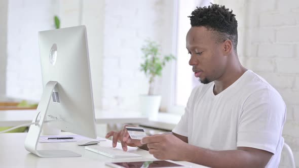 Disappointed Casual African Man Reacting To Online Payment Failure 