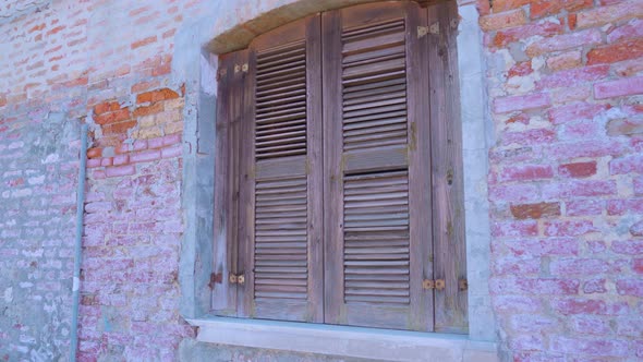 Wooden Shuttered Window of Abandoned Building in Burano