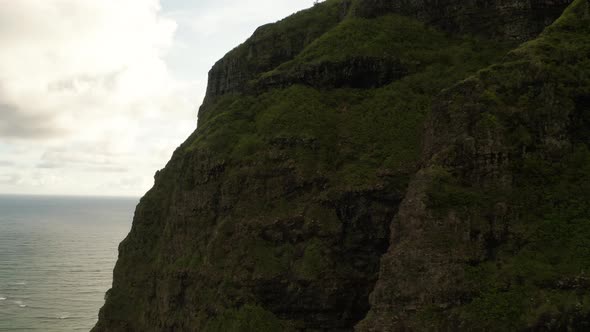 Drone Aerial Cliffside Push towards Ocean, Kualoa Ranch. Oahu, Hawaii