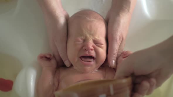  - Newborn Baby Is Scared with Bathing