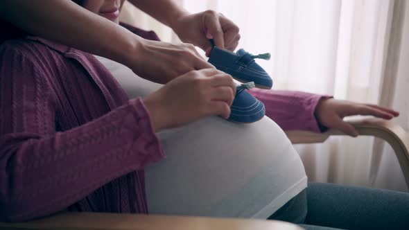 Pregnant Couple Feels Love and Relax at Home