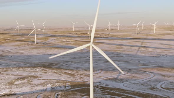 Aerial shots of wind turbines on a cold winter afternoon in Calhan, Colorado