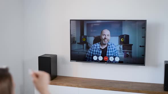 A Woman Is Talking at Home Via Video Link