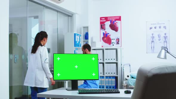 Computer with Green Screen in Hospital Cabinet