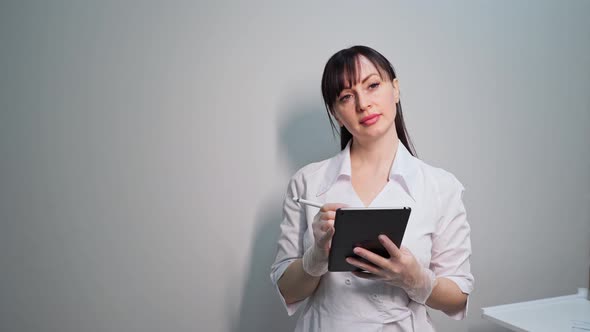 Doctor Using Tablet