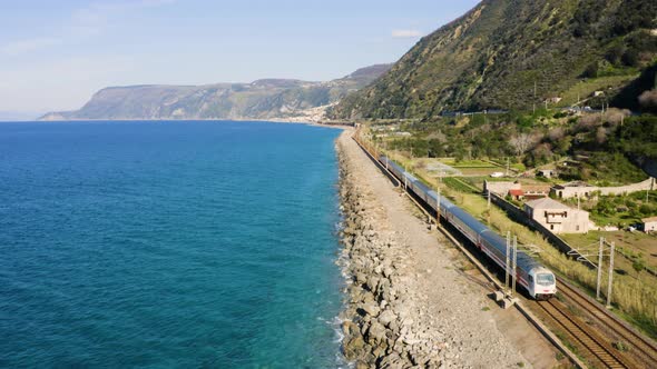 High Speed Train Tracking alongside the Ocean