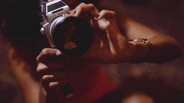 Woman With Afro Hair Filming With Vintage 8Mm Camera