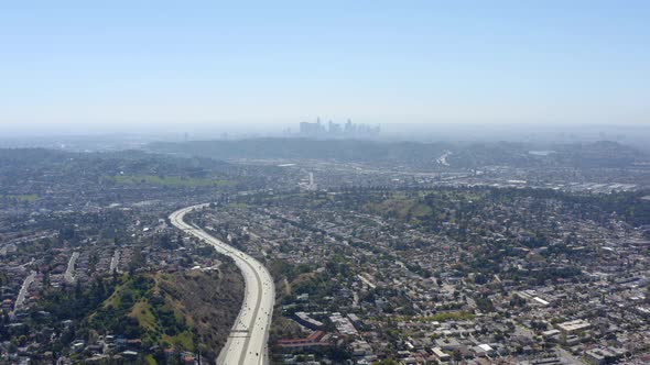 Beautiful aerial view to the cars driving on multi-level highway in Los Angeles. 