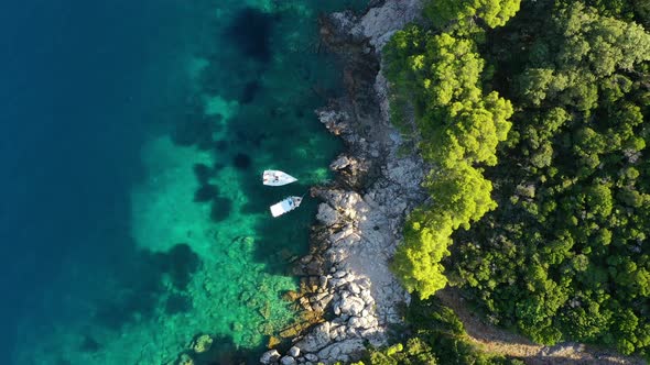 Aerial view on rocks and forest. Vacation and adventure. Rocks and turquoise water