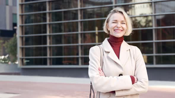 Confident Female Executive Employee of Modern Business Company