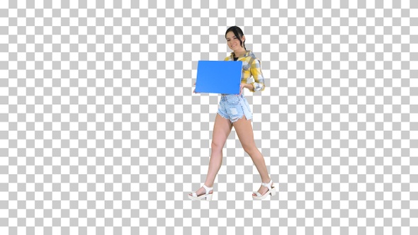 Young charming brunette model holding empty board, Alpha Channel