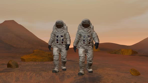 Two Astronauts Walking On The Surface Of Mars