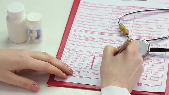 POV of Doctor Filling Out Health Insurance Claim Form, Completing Medical Info