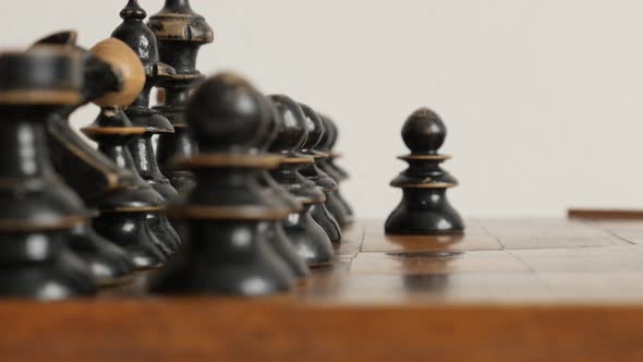 Old chess set figures arranged on game playing table 4K 2160p 30fps UltraHD footage - Blac player pa alt