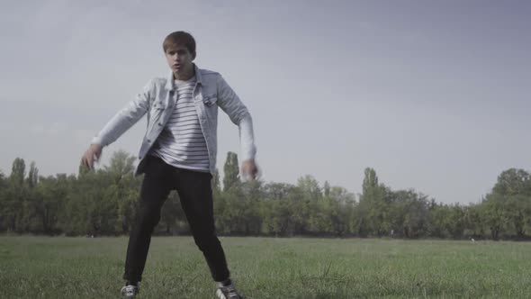 Dance of Cheerful Carefree Caucasian Young Man Outdoors