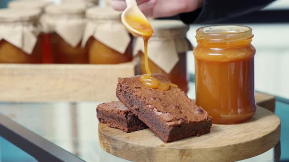 Caramel Drips Appetizingly Over the Chocolate Cake