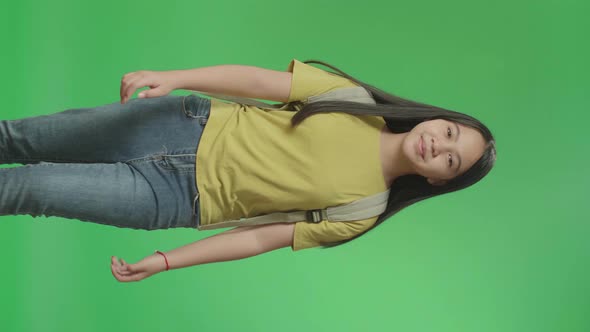 Asian Girl Student Walking To School On Green Screen Chroma Key