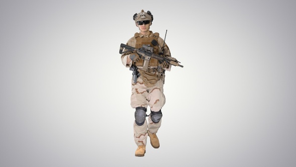 US Army soldier in combat uniform walking on gradient background.