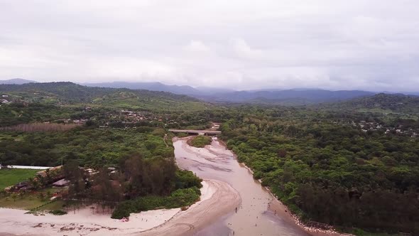 View Of The Olon Beach, Ecuador With Green Trees and Different Houses - Aerial Shot