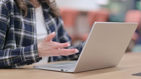 Female Hands Showing Disappointment While Using Laptop