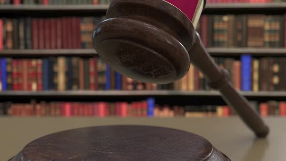 Flag of Qatar on Falling Judges Gavel in Court