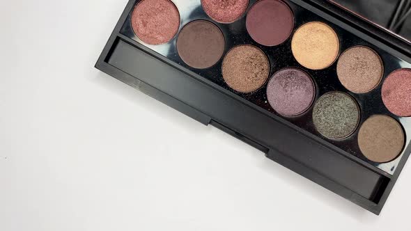 Palette of Eyeshadows for Face and Eyes Closeup