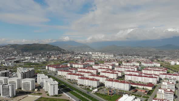  Aerial View of Adler, Sochi Beach, Town and Mountains