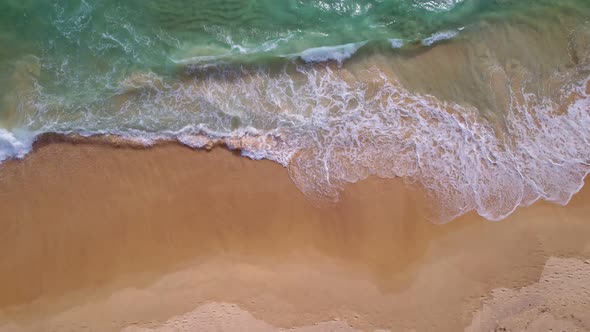 Beautiful waves Foaming and Splashing on the beach sand. Ocean sea. Beautiful waves in open sea