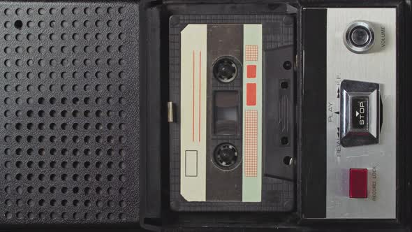 Vintage Audio Cassette Plays in Tape Deck