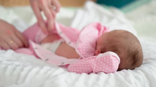 Cute Little Newborn Baby Sleeping in a Dream