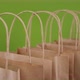 Paper package bags for shopping or delivery isolated on green background - VideoHive Item for Sale