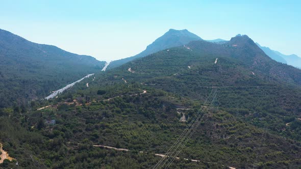 Cars travelling on highway that winds through the mountains towards Nicosia Cyprus