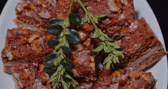 Traditional Walnut Cake on Plate Rotating