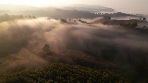 4K Drone Flying in the clouds. Flying through the clouds during sunrise