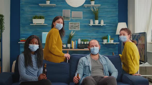 Group of Multiethnic Friends with Face Mask Talking with Remote People