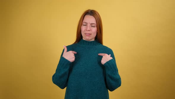 Young Red Hair Woman Posing Isolated on Yellow Color Background Studio