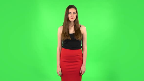 Girl Looks in Surprise at Camera and Is Shocked By What She Saw. Green Screen