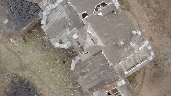 view on dilapidated roof of old building in forest