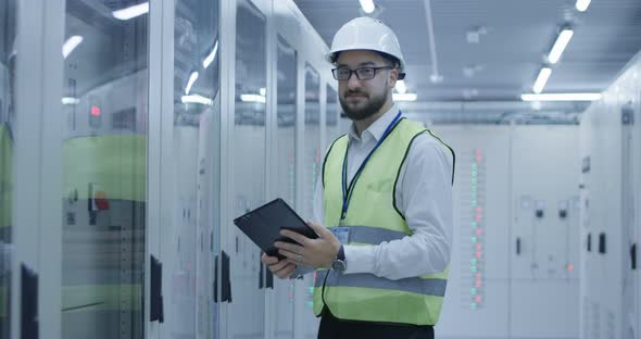 Man in Control Center of Solar Power Station