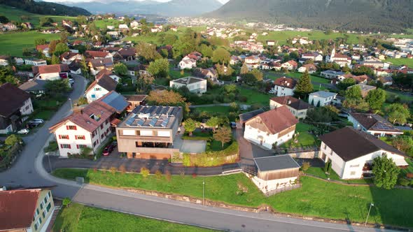 Aerial View of Liechtenstein with Houses on Green Fields in Alps Mountain Valley