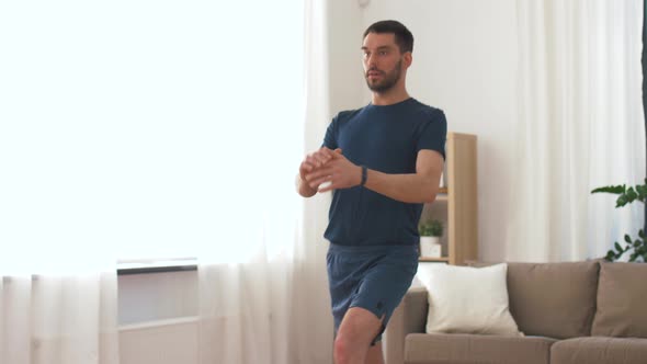 Man Exercising and Doing Lunge at Home 19