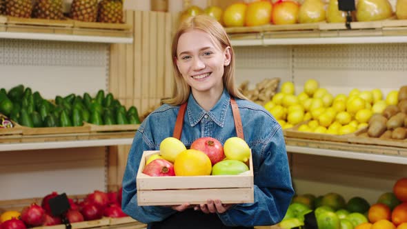 In the Organic Vegetable Shop Amazing Young Woman