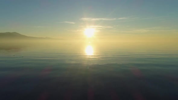 Lake Geneva at Sunset. Sun Reflection. Switzerland. Aerial Shot