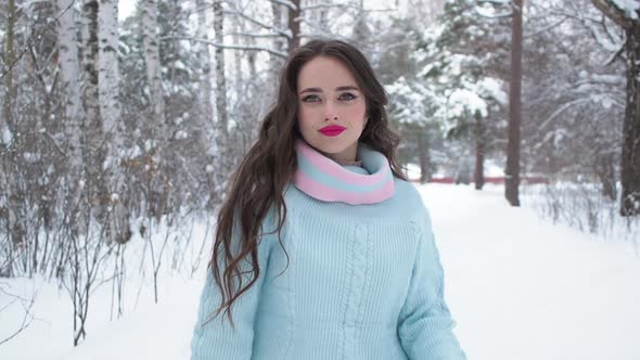 Stylish Young Woman Walking Towards Winter Forest