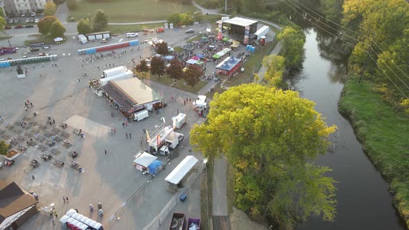 Festival grounds in La Crosse, Wisconsin. Calm river water and green foliage.