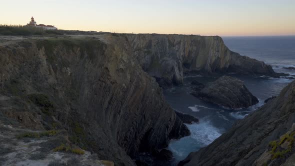 Cabo do Sardao Lighthouse Cape view at sunrise, in Portugal